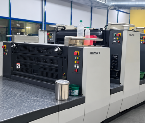 Komori L-528 + Coater (2003) - UV
